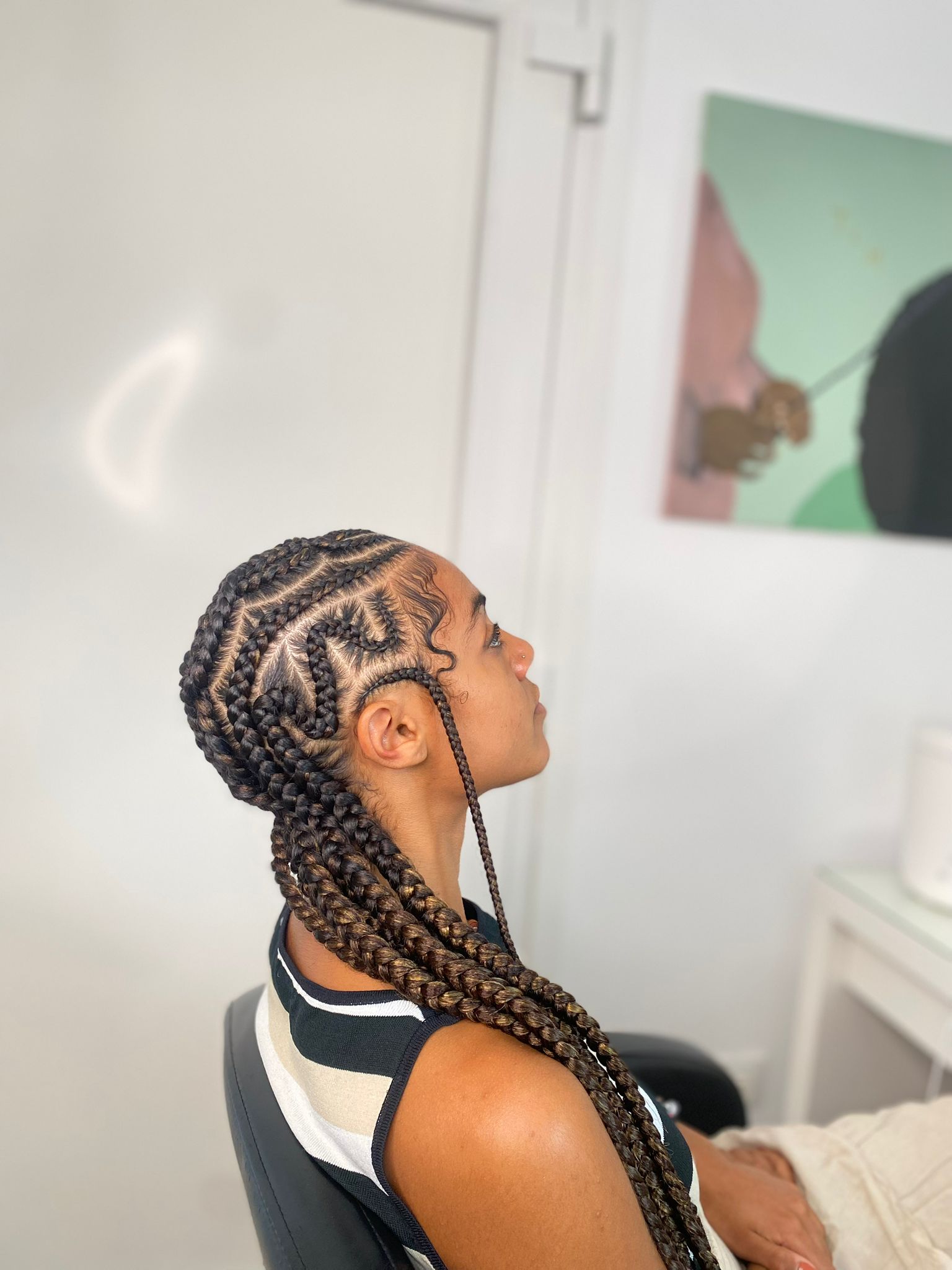 Trenzas Fulani con diseño geométrico lateral